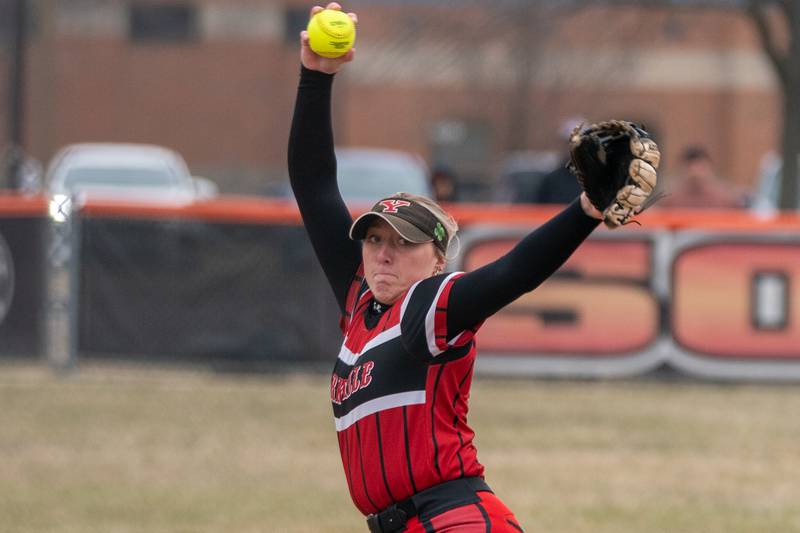 Yorkville's Madilyn Reeves (2) delivers a pitch against St.Charles East during a softball game at St.Charles East High School on Wednesday, Mar 22, 2023.