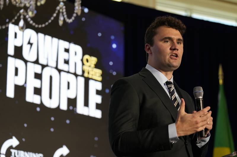 Turning Point USA founder Charlie Kirk introduces Brazil's right wing ex-president Jair Bolsonaro, at a TPUSA event at Trump National Doral Miami, Friday, Feb. 3, 2023, in Doral, Fla.