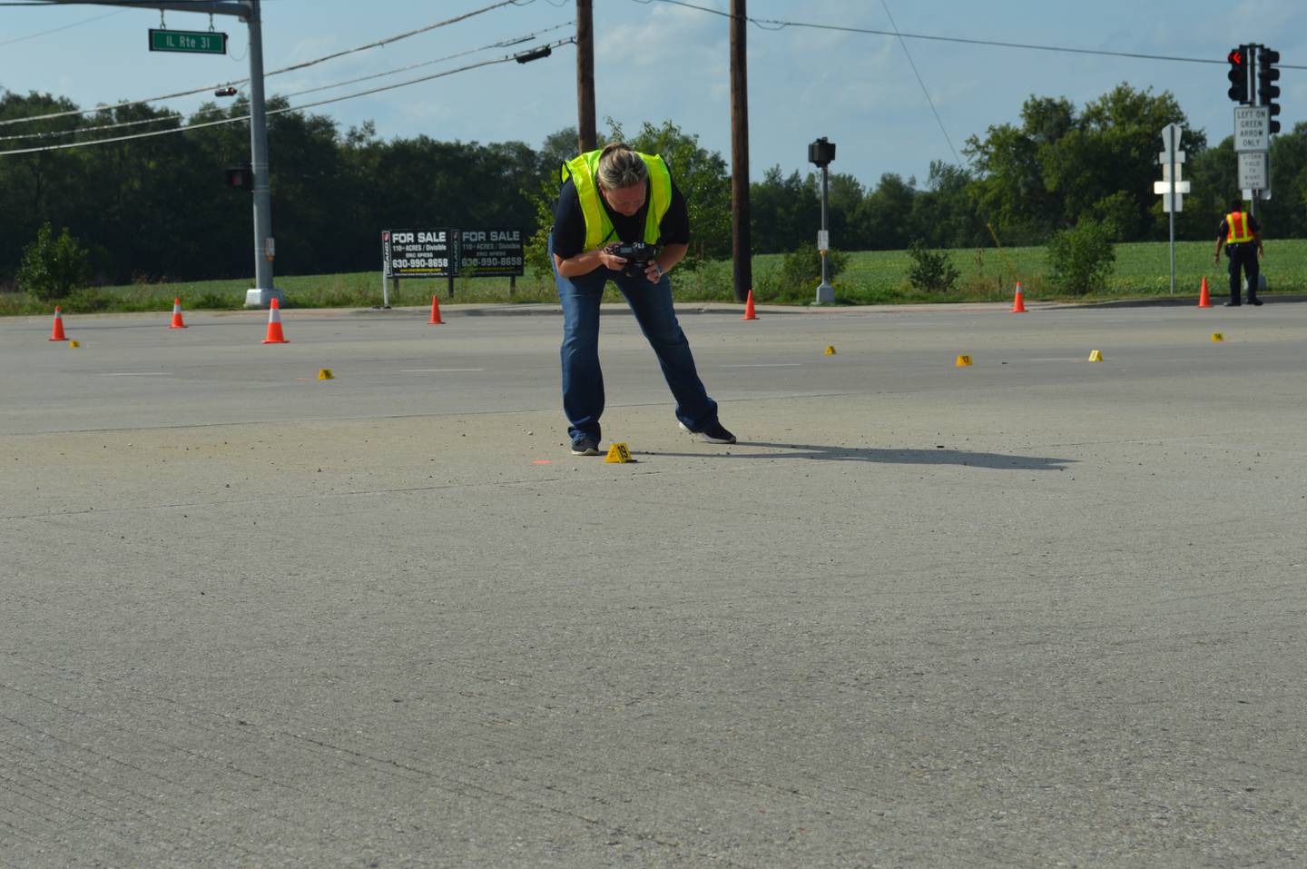 Investigators with the McHenry Police Department spent hours taking photos and gathering evidence at the intersection of Illinois Route 31 and Bull Valley Road on Sunday, Aug. 29, 2021 after a report of shots fired in the area.