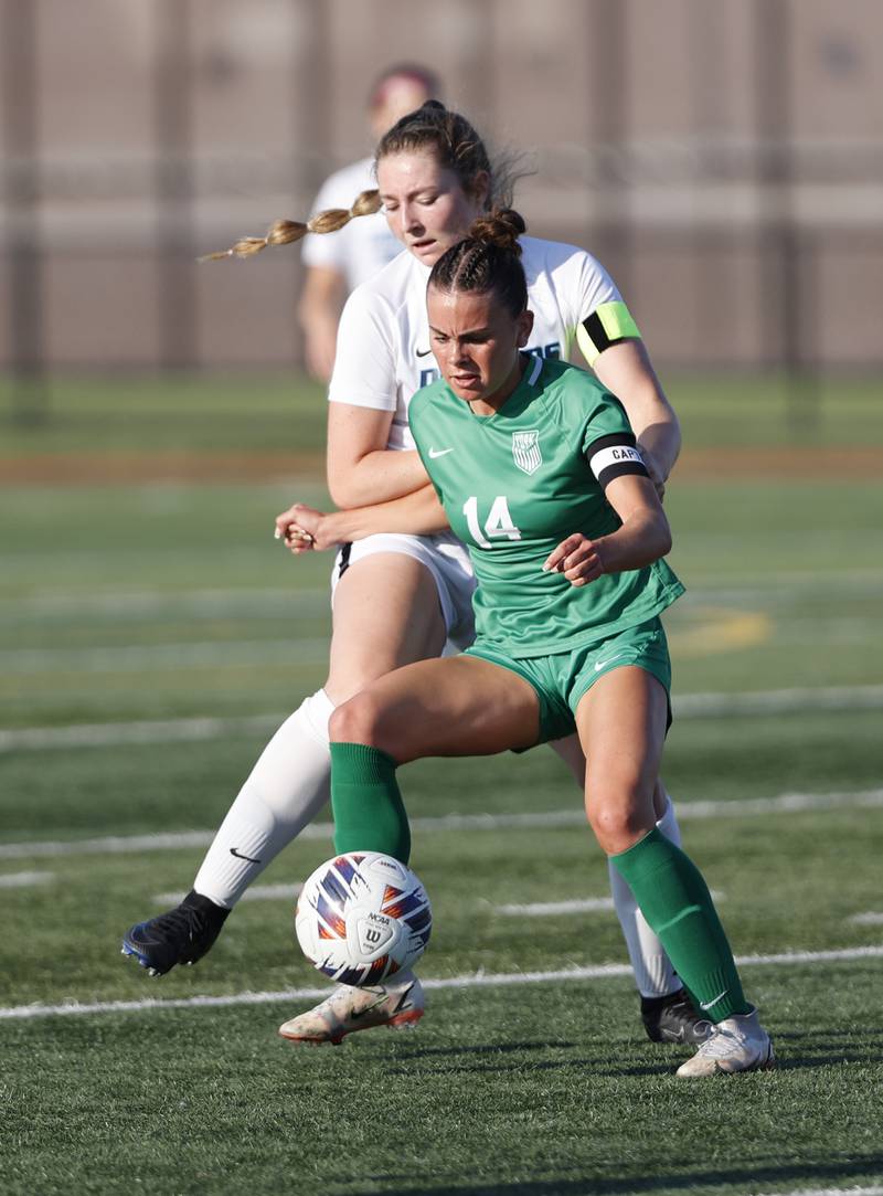 York's Michaela Quinn (14) goes after the ball during the Class 3A Morton regional girls soccer final between Downers Grove South and York in Berwyn on Friday, May 17, 2024.