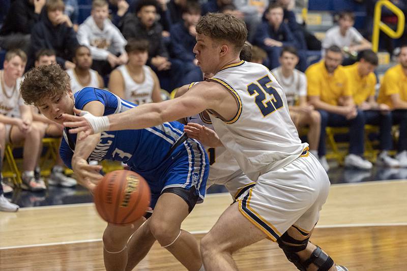 Sterling’s Kael Ryan guards a Quincy player Friday, Jan. 27, 2023.