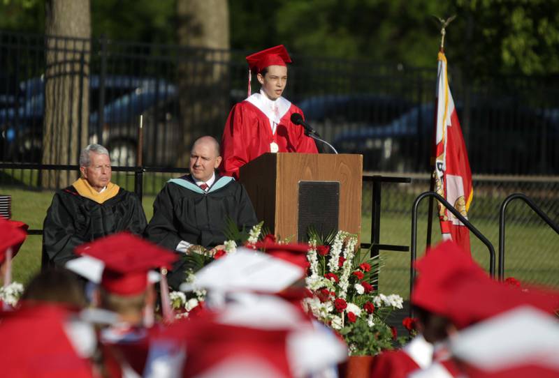 Benet graduate Samuel Panatera gives the salutatory address during the school’s commencement ceremony in Lisle on Thursday, May 25, 2023.