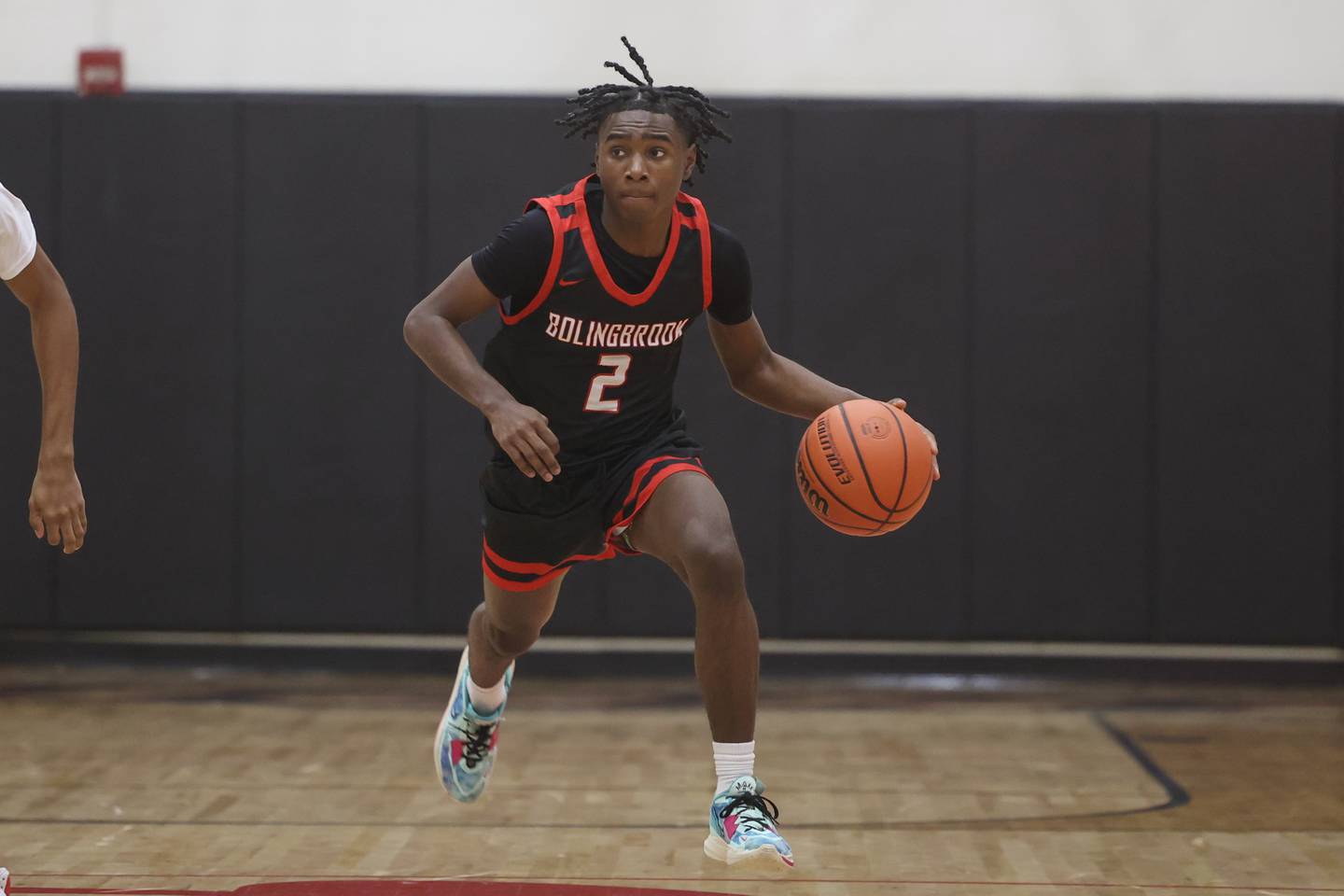 Bolingbrook’s DJ Strong takes the ball upcourt against Lincoln-Way Central.