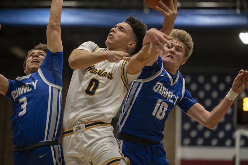 Sterling’s Andre Klaver is fouled while working against Quincy Friday, Jan. 27, 2023.