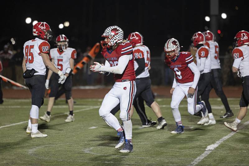 West Central’s Aydin Reed celebrates a fumble recovery  Friday, Nov. 18, 2022 in the 8-man championship football game against Amboy.