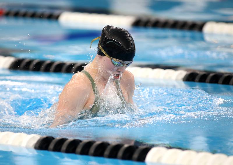Lyons Township’s Ella Jean Kelly competes in the 100-yard breaststroke consolation heat during the IHSA Girls State Championships on Saturday, Nov. 16, 2024 at FMC Natatorium in Westmont.