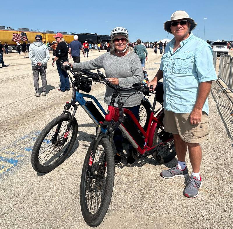 Gary and Jackie Chesney, of Richmond, Illinois, parked their car in Rochelle and rode their e-bikes 2.5 miles to the UP Global II terminal to see the Big Boy 4014 vintage steam locomotive on Sunday, Sept. 8, 2024.