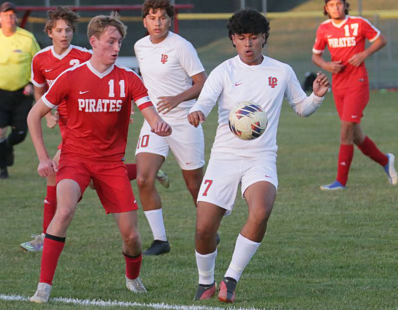 L-P's Brayan Gonzalez (7) knocks the ball down from Ottawa's Adam Gross (11) on Monday, Oct. 3, 2022 in Ottawa.