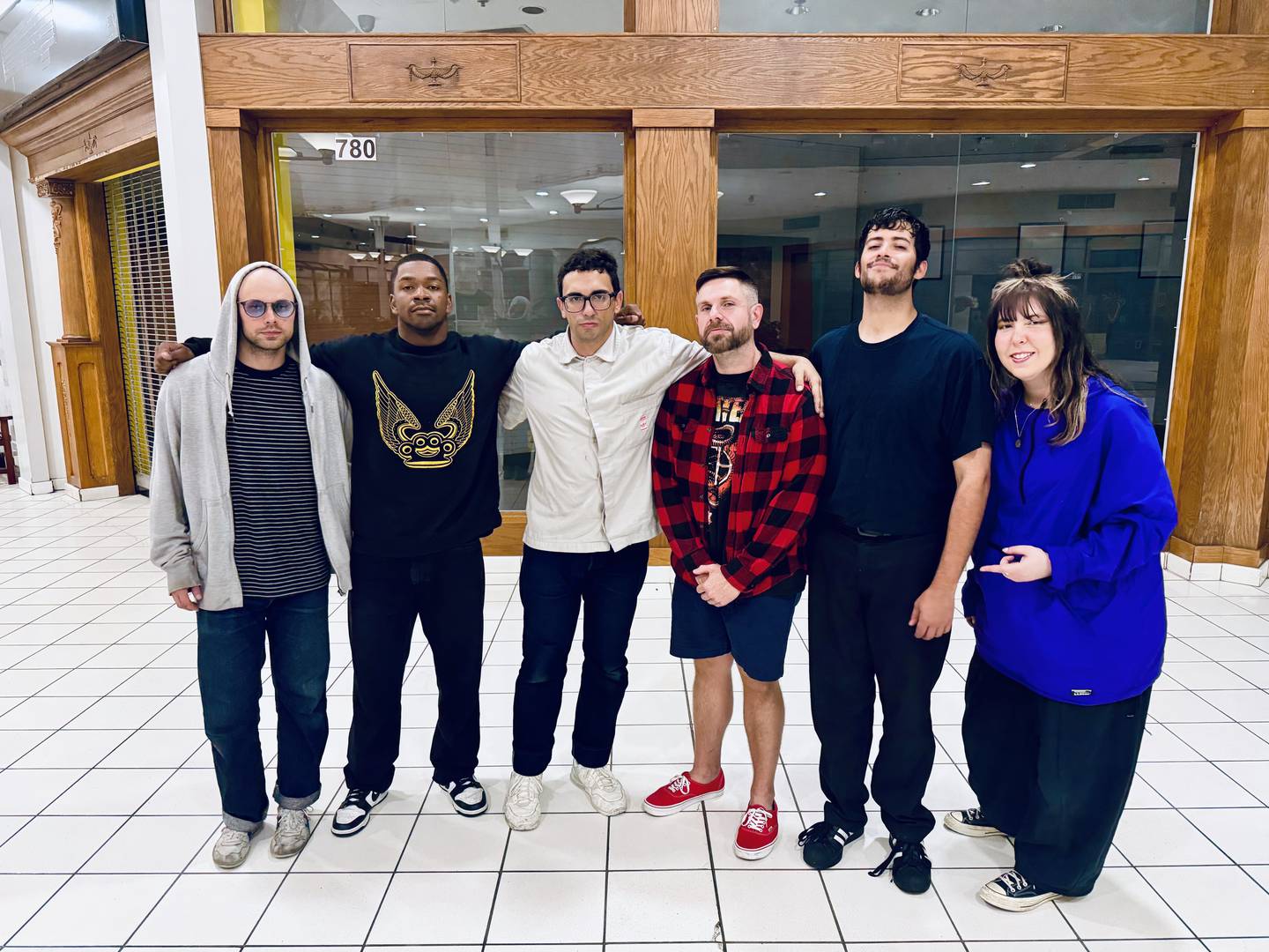 Blain Smith, third from right, is pictured with the Boston-based rock band Fleshwater at Northfield Square mall in Bradley, where Smith was a producer for the band's music video for the song "Last Escape."