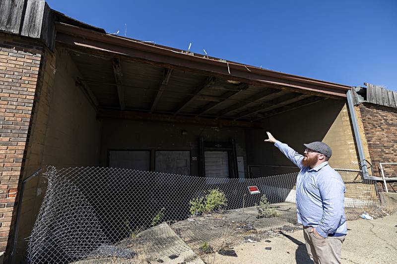 Some sections of the building, like this old loading dock area, are not safe to save and could be turned into a green space area for the downtown.
