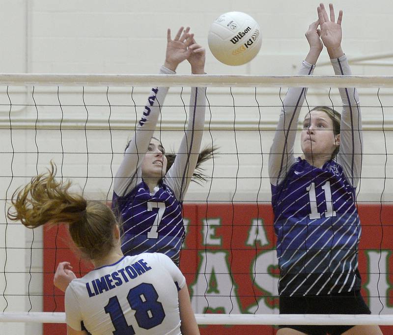 Dixon’s Sydney Hargrave and Ella Govig team up to block a shot by Limestone’s Mattie Daffron in the first match during the Class 3A Sectional semifinal game on Monday, Oct. 31, 2022 at La Salle-Peru Township High School.