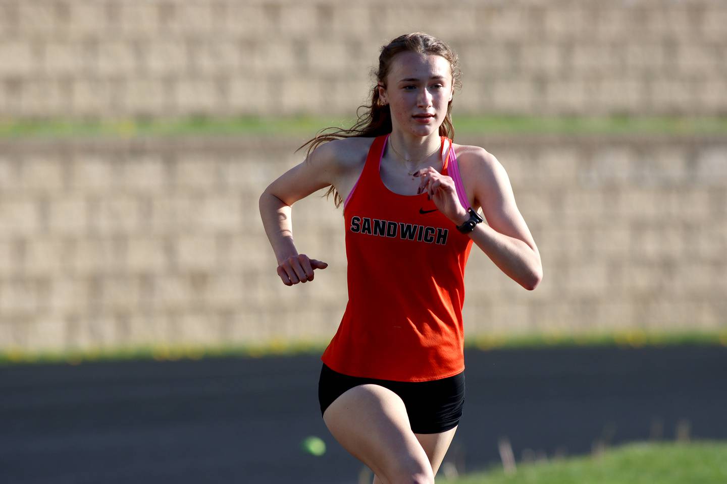 Sandwich’s Sundara Weber wins the 3200-meter run during the Kishwaukee River Conference Girls Conference Championships track meet at Harvard High School Tuesday.