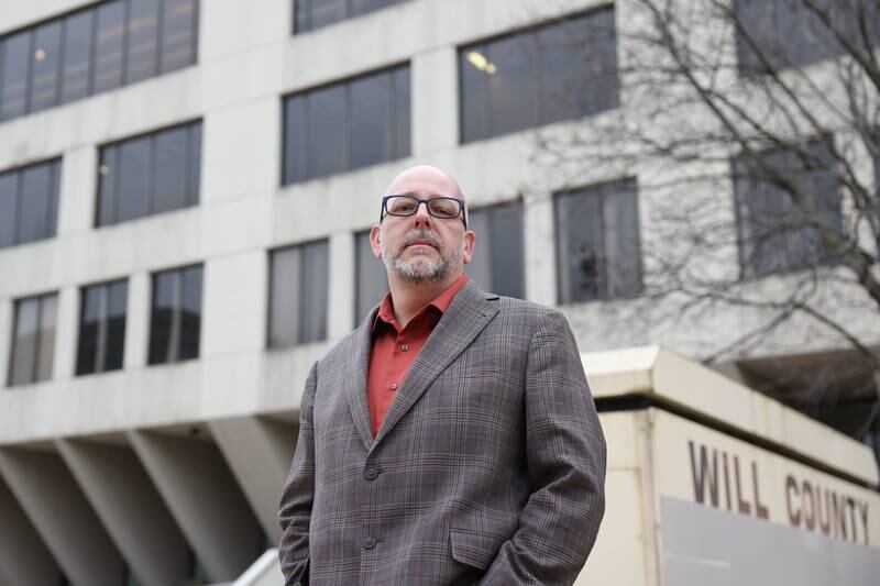 Quinn Adamowsk, Landmarks Illinois Regional Advocacy Manager, stands outside the old Will County Courthouse in Joliet on January 24th, 2023.