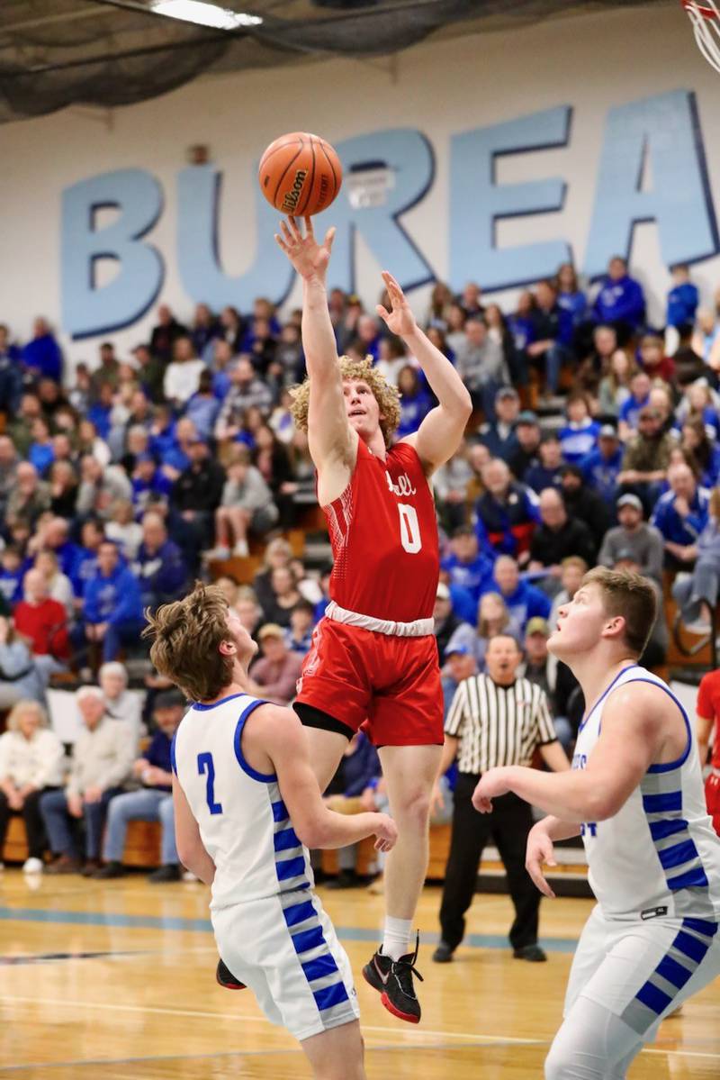 Hall's Mac Resetich lets one fly during Thursday's regional semifinals at the Storm Cellar. Princeton won 88-43.