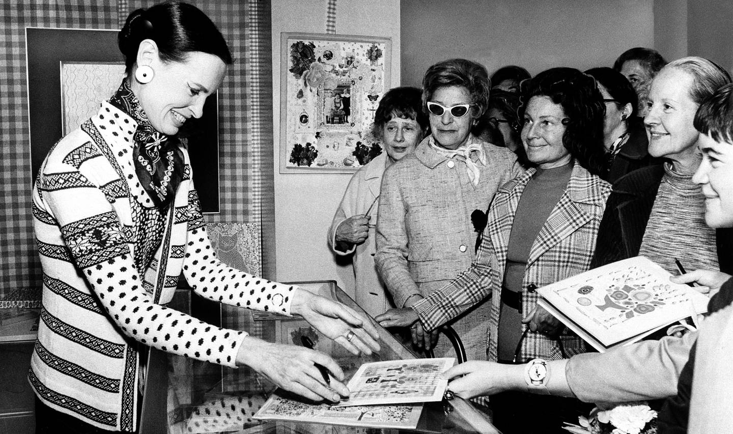 Designer Gloria Vanderbilt (left) introduces her Mother's Day greeting cards, designed for Hallmark, at a New York City store, on May 3, 1972.