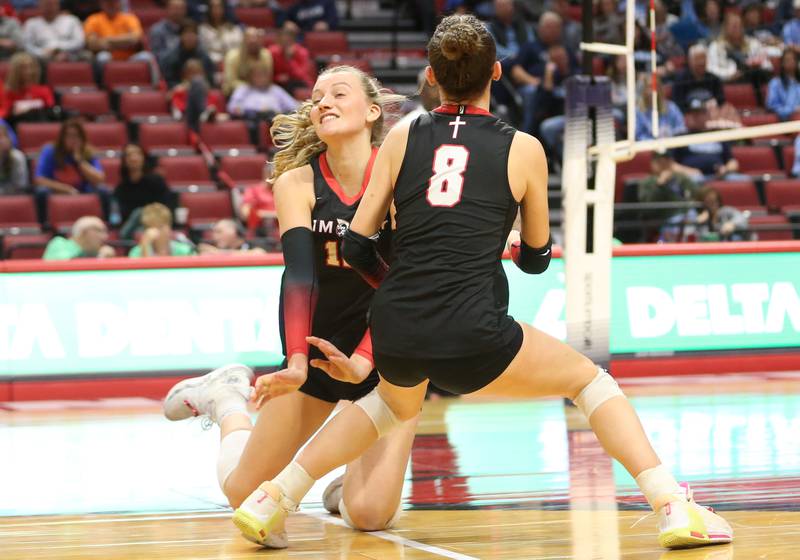 Timothy Christian's Abby VanderWal collides with teammate Elizabeth Alex while diving for the ball during the Class 2A State semifinal game on Friday, Nov. 15, 2024 at CEFCU Arena in Normal.