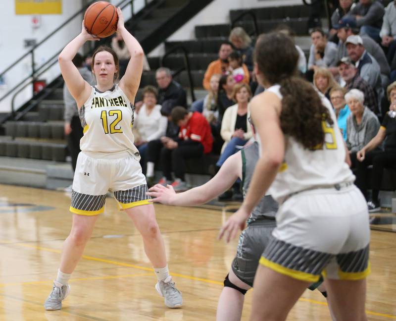 Putnam County's Mikenna Boyd looks to pass the ball against Midland during the Class 1A Regional game on Monday, Feb. 13, 2023 at Putnam County High School.