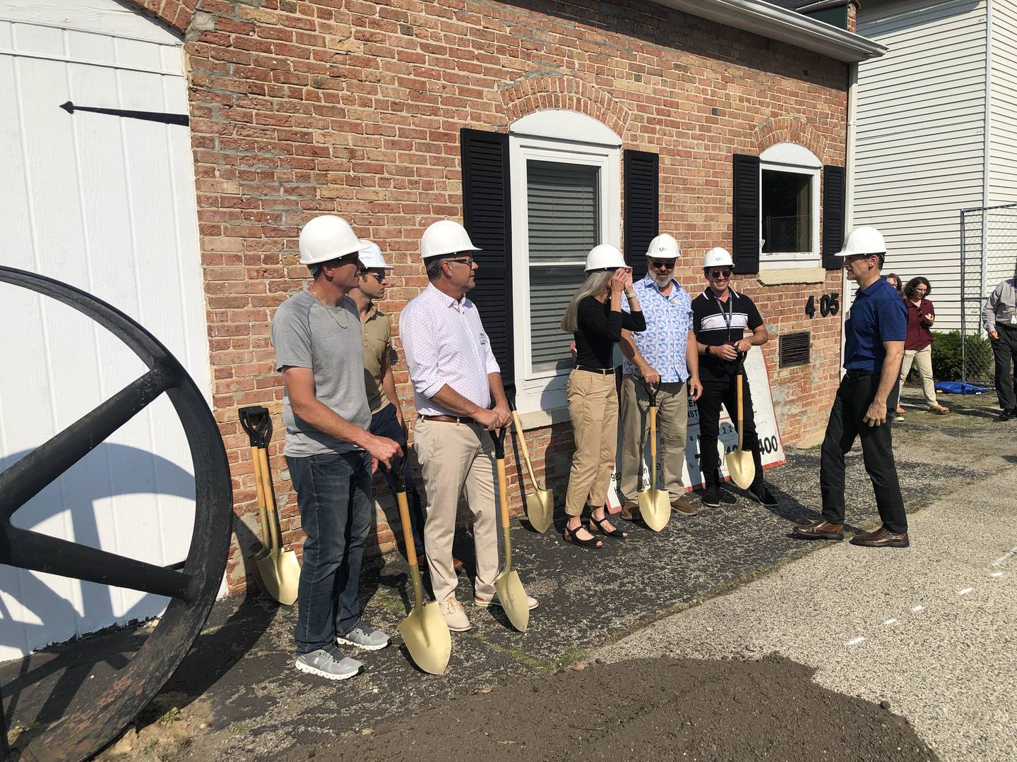 Officials from the city of McHenry, McHenry County, Northpointe Development and the Housing Opportunity Development Corporation prepare for a second groundbreaking event for McHenry's Taylor Place apartments on Tuesday, July 30, 2024. Construction is set to begin shortly for the workforce housing development.