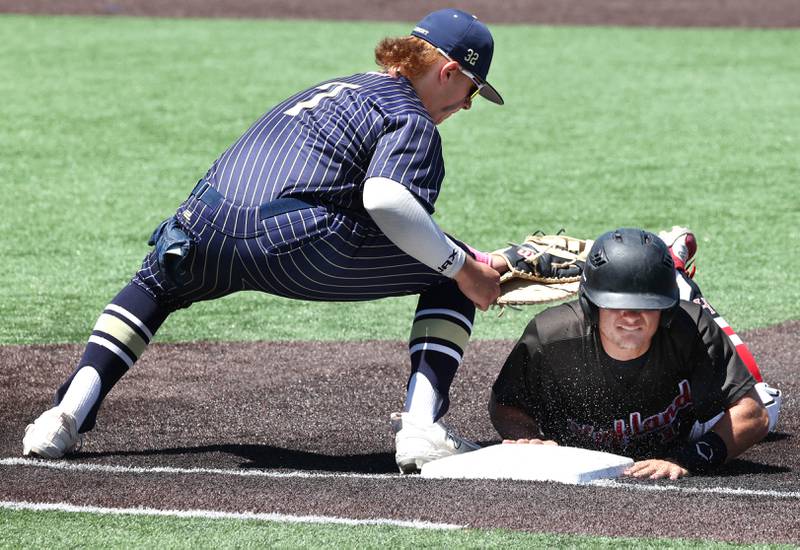Highland's Blake Gelly slides back safely as Lemont's Nick Berardi applies the tag on a pickoff attempt during their Class 3A state semifinal game Friday, June 7, 2024, at Duly Health and Care Field in Joliet.