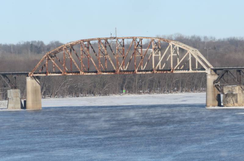 Steam and ice can be seen underneath the Railroad Bridge on Tuesday, Jan. 16, 2024, near La Salle.