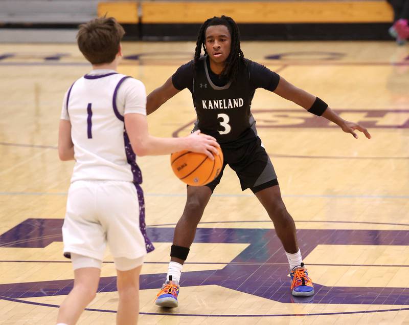 Kaneland's Marshawn Cocroft plays defense against Rochelle's Cohen Haedt Tuesday, Feb. 3, 2026, in their game at Rochelle High School.