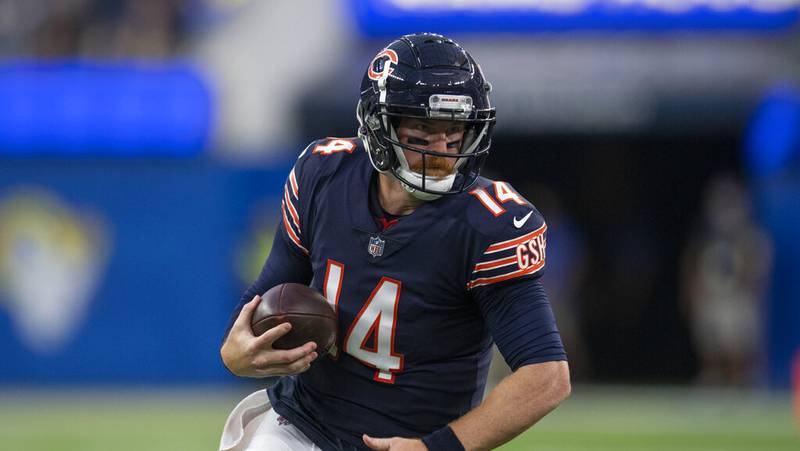 Chicago Bears quarterback Andy Dalton (14) sprints with the ball during an NFL football game against the Los Angeles Rams Sunday, Sept. 12, 2021, in Inglewood, Calif.