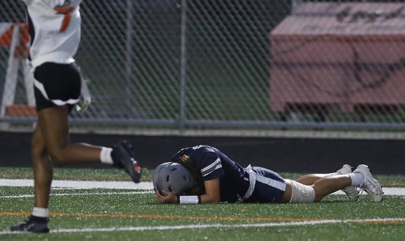 Cary-Grove's Kennedy Manning reacts to Harlem’s Hari Young scoring a touchdown during an IHSA McHenry Sectional semifinal girls flag football game on Monday, Oct. 13, 2025, at McCracken Field in McHenry.