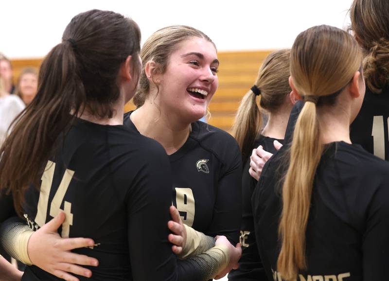 Sycamore players celebrate their Class 3A regional championship win over Dixon Thursday, Oct. 30, 2025, in Rochelle.