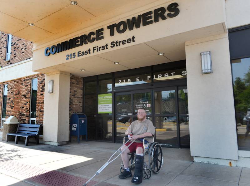 Carl Maves of Rock Falls waits for his ride at Commerce Towers in Dixon on Thursday. KSB has announced that it will begin valet service again June 19, staffed by volunteers.