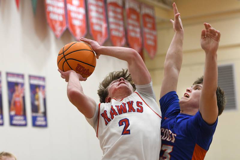 Oregon's Cooper Johnson shoots against Genoa-Kingston's Conner Harney on Friday, Jan. 30, 2026 at the Blackhawk Center.