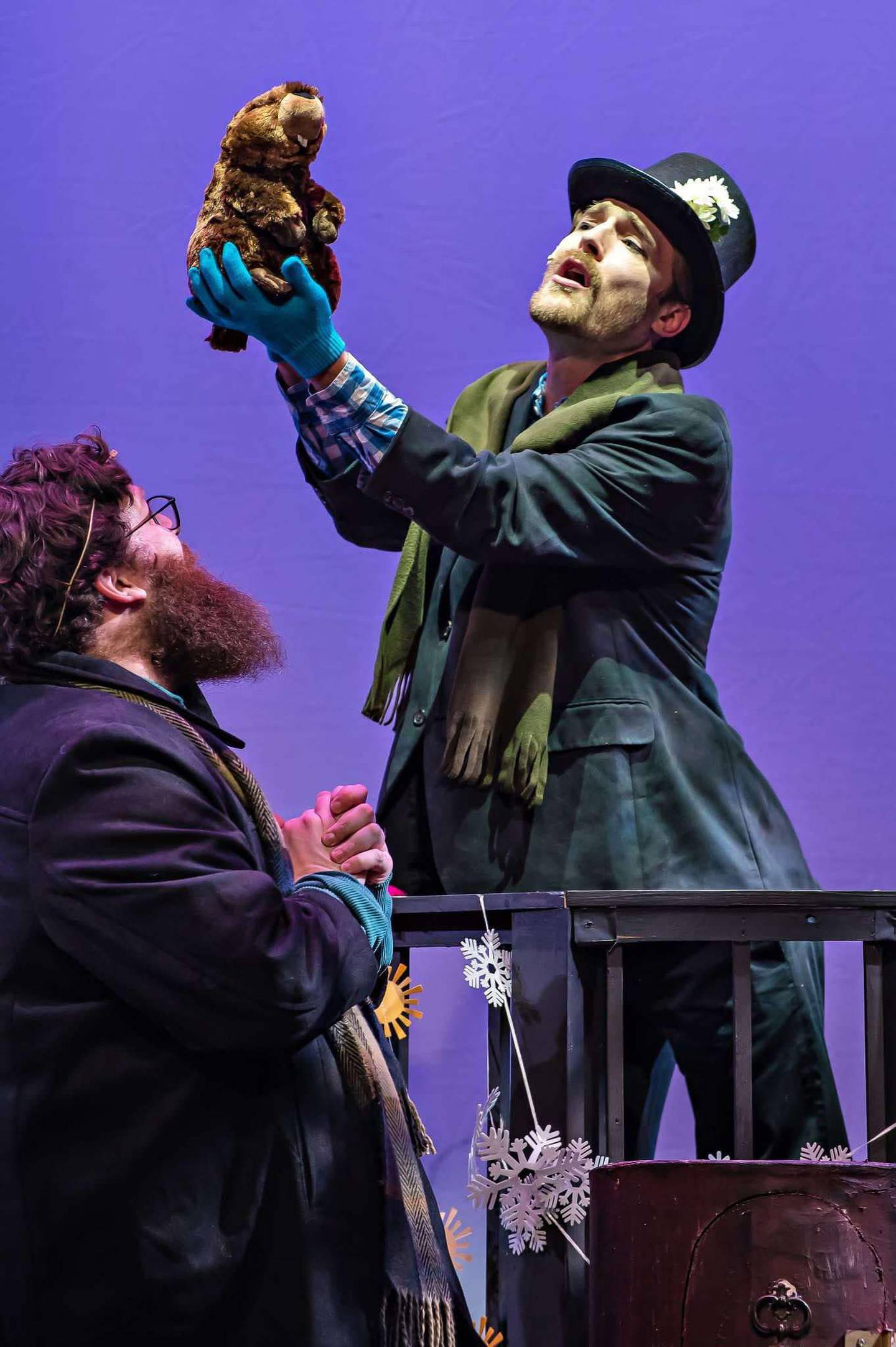 Ralph (Nathan S. Forrester, from left) and Buster (Brett Barry) celebrate the title character in "Groundhog Day: The Musical" through Feb. 16 in the Woodstock Opera House.