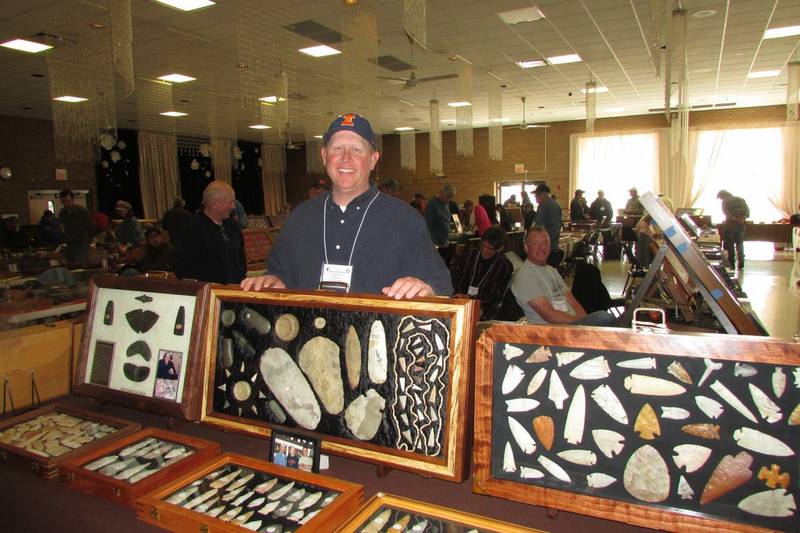 Scott Carruthers shows off displays planned for the 18th annual Starved Rock Native American Artifacts Show scheduled 8 a.m. to 3 p.m. Sunday, July 18, at the Grand Bear Resort.