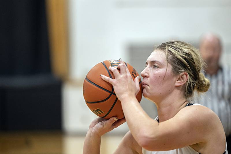Rock Falls’ Claire Bickett prepares to put up a three-point shot against Newman Thursday, Nov. 16, 2023.