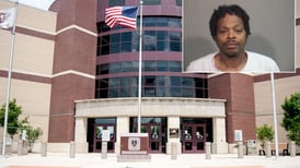 Man accused of firing gun outside Woodstock apartment