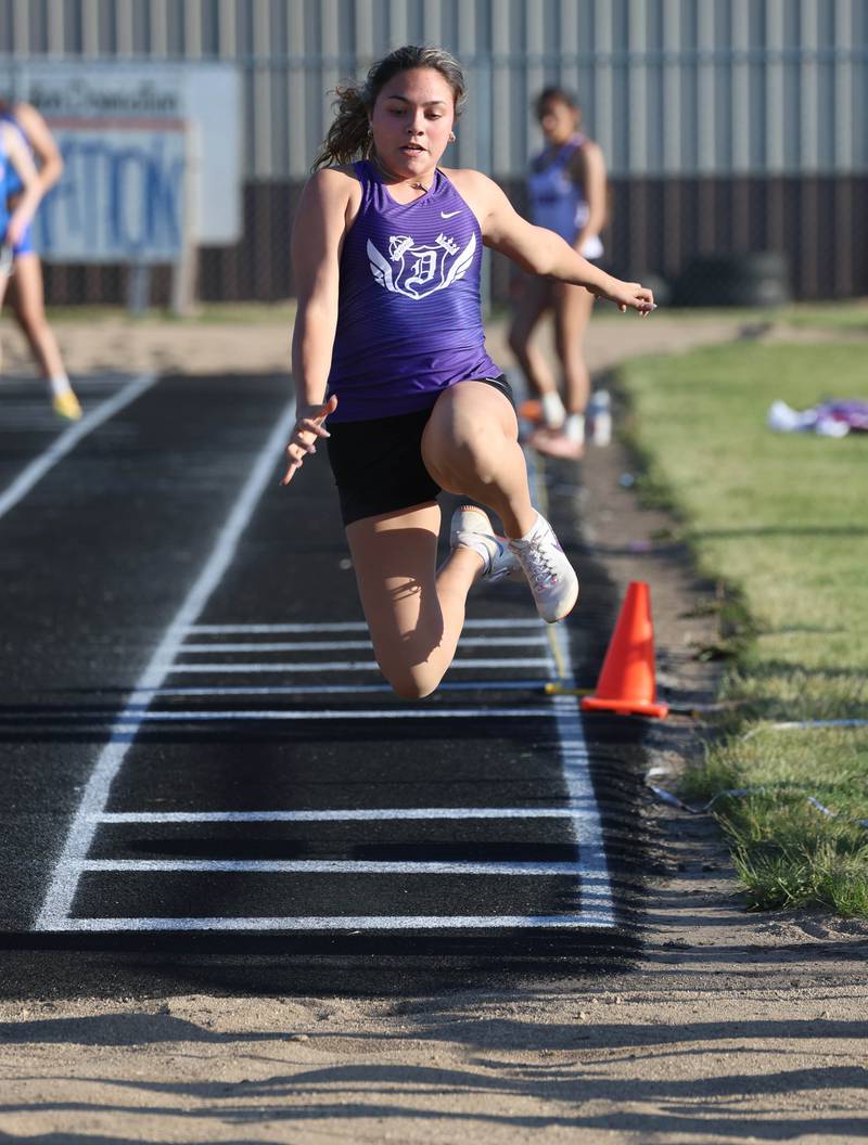 Dixon’s Sarah MacRunnels competes in the triple jump Friday, May 15, 2026, during the Class 2A girls track sectional at Genoa-Kingston High School.