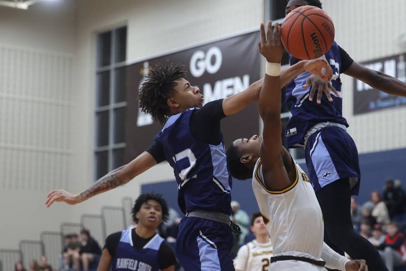 Plainfield South’s Armaan Hilton blocks a shot against Joliet Catholic on Wednesday, Jan. 17th, 2024 in Joliet.