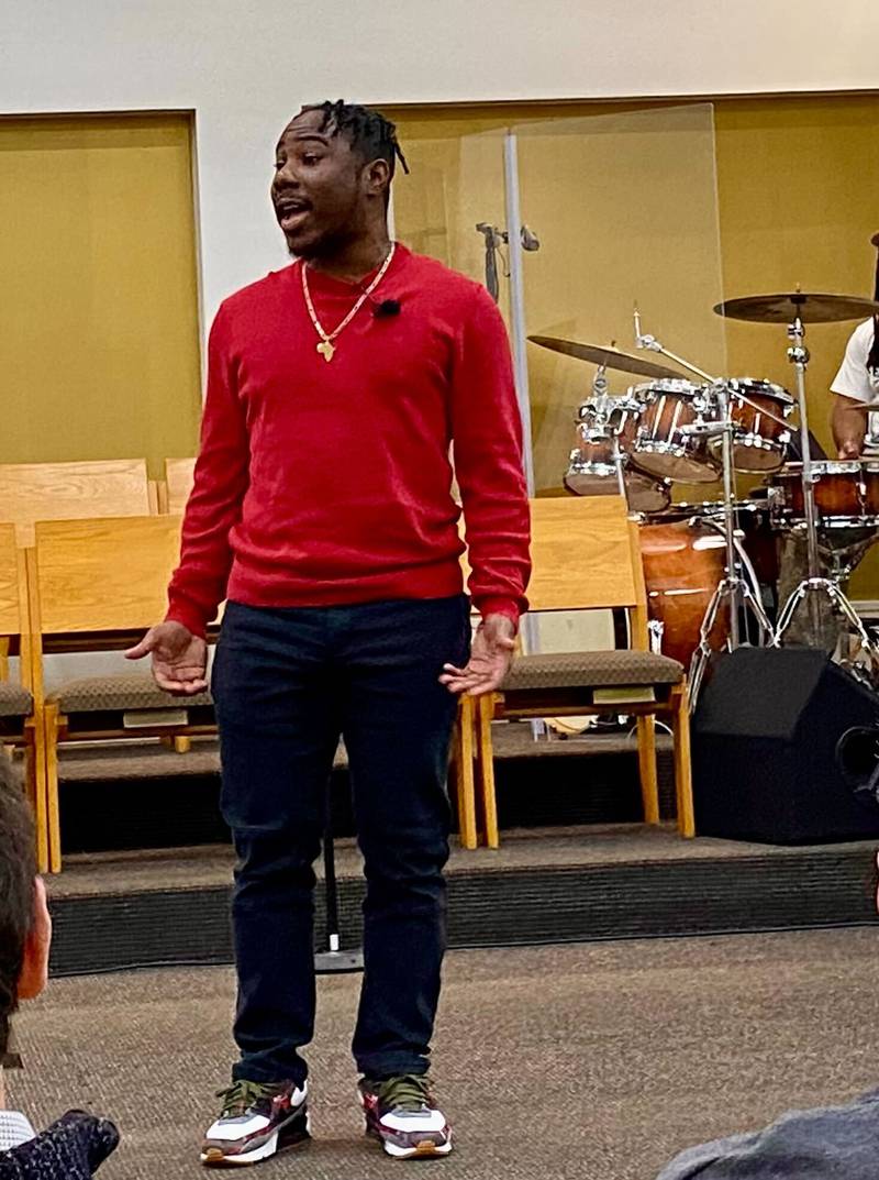 Darius Jackson performs a slam poem about Martin Luther King, Jr. and America during a celebration event for MLK Day on Monday, Jan. 20, 2025, at New Hope Missionary Baptist Church, 1201 Twombly Road, DeKalb. The event was hosted by New Hope in collaboration with multiple area churches.