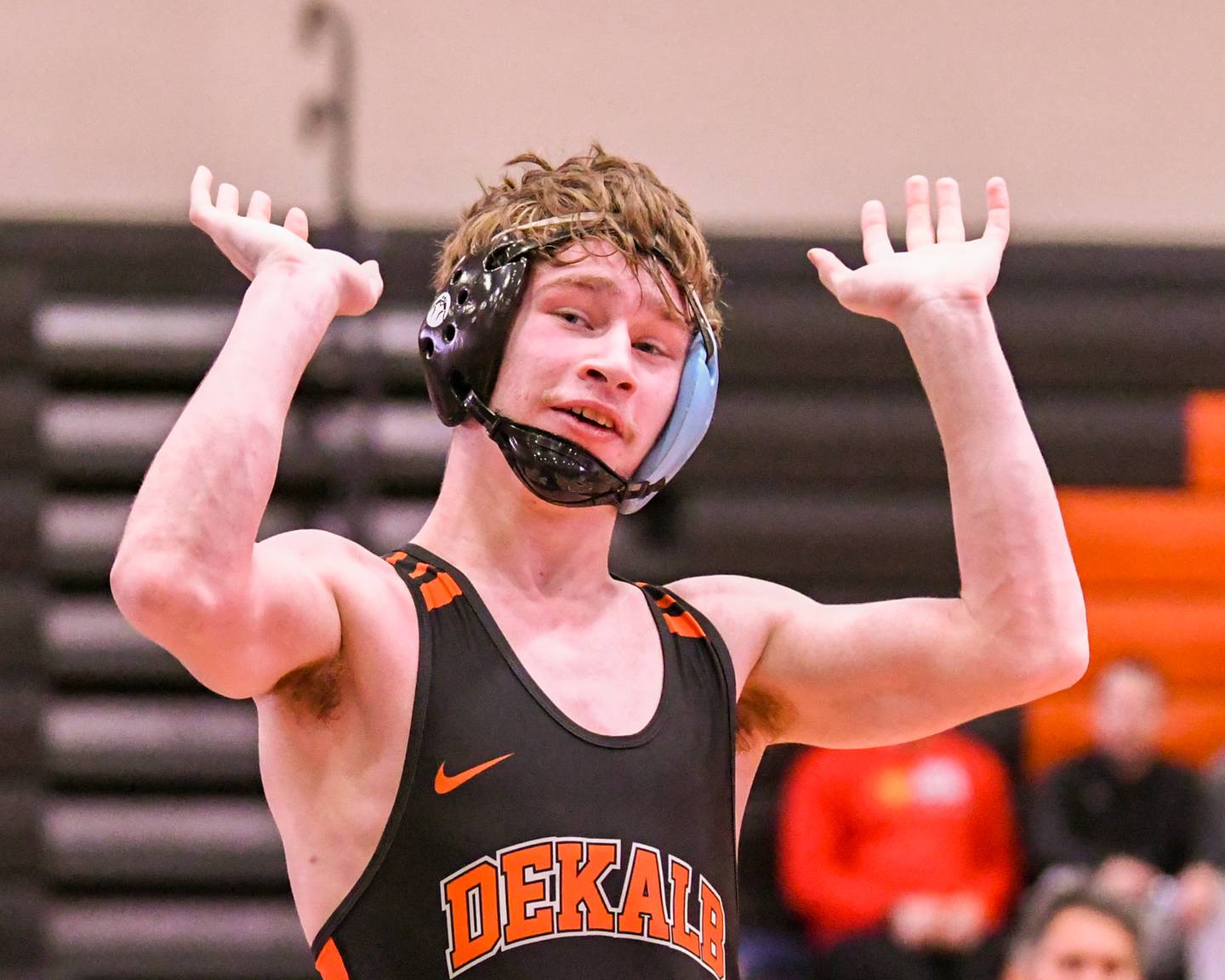 DeKalb’s Ayden Shuey celebrates his first place finish in the 132-weight class during the regional title match on Saturday Jan. 31, 2026, held at DeKalb High School.