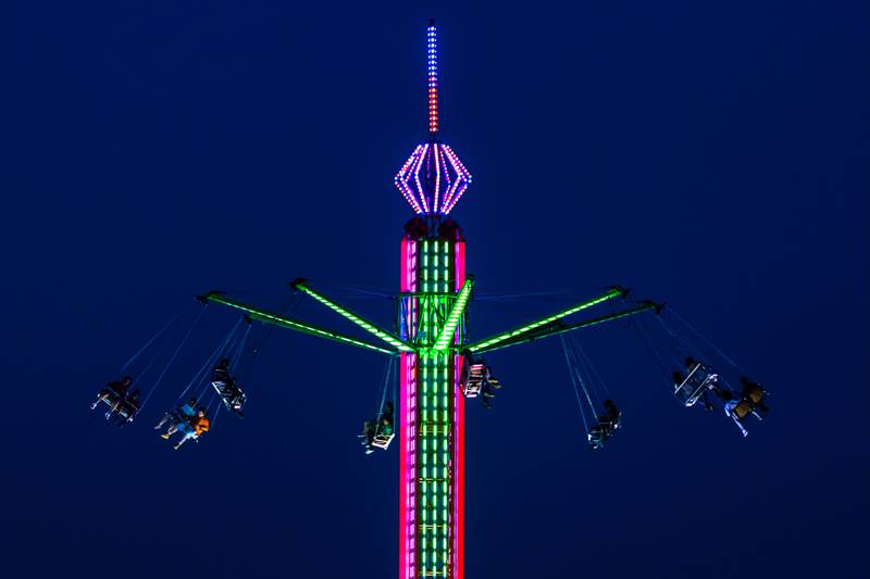 Attendees ride the swings during Taste of Joliet on June 21, 2025.