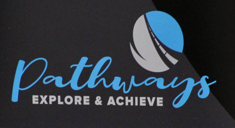 Pathways Explore and Achieve logo, seen on a banner on Friday, April 21, 2023, at Sauk Valley Community College.