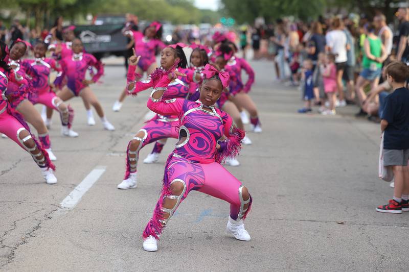 Dancers with the Pretty Savage Elite perform in the Old Canal Days Parade on Friday June 7, 2024 in Lockport.