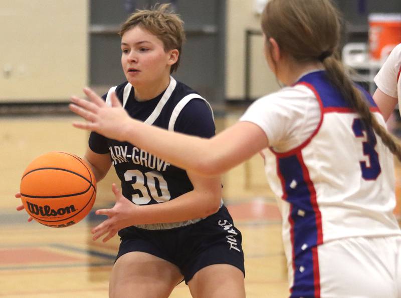 Cary-Grove’s Jayden Sopata-Rahn moves the ball against  Lakes in varsity girls basketball action on Friday, Jan. 2, 2026  at Lakes High School in Lake Villa.