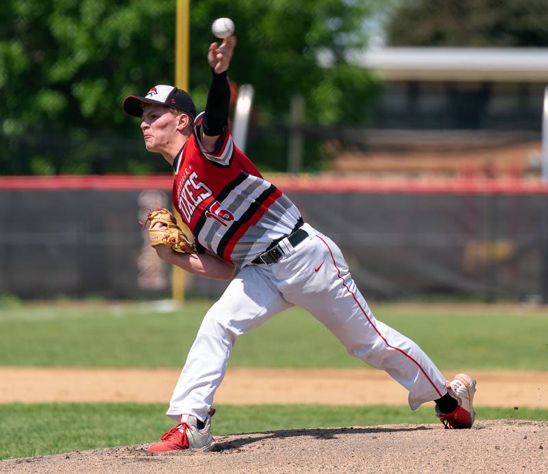 Yorkville's Simon Skroch (16) delivers a pitch against Plainfield North during the Class 4A Yorkville Regional baseball final at Yorkville High School on Saturday, May 28, 2022.