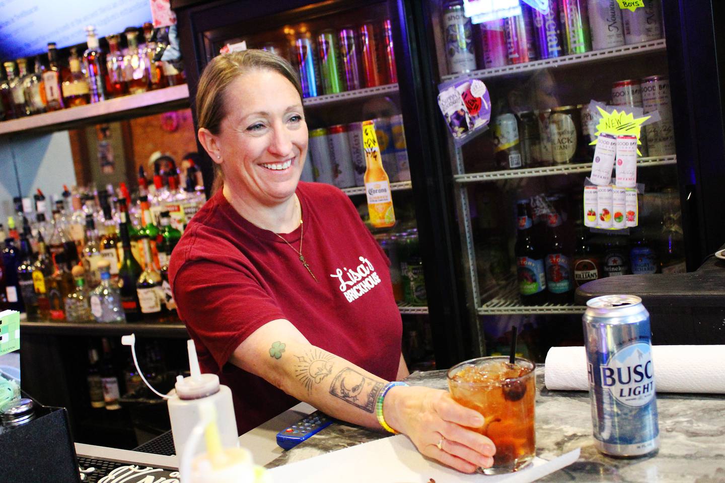 Saleena Surratt serves an old fashioned at Lisa's Brick House.