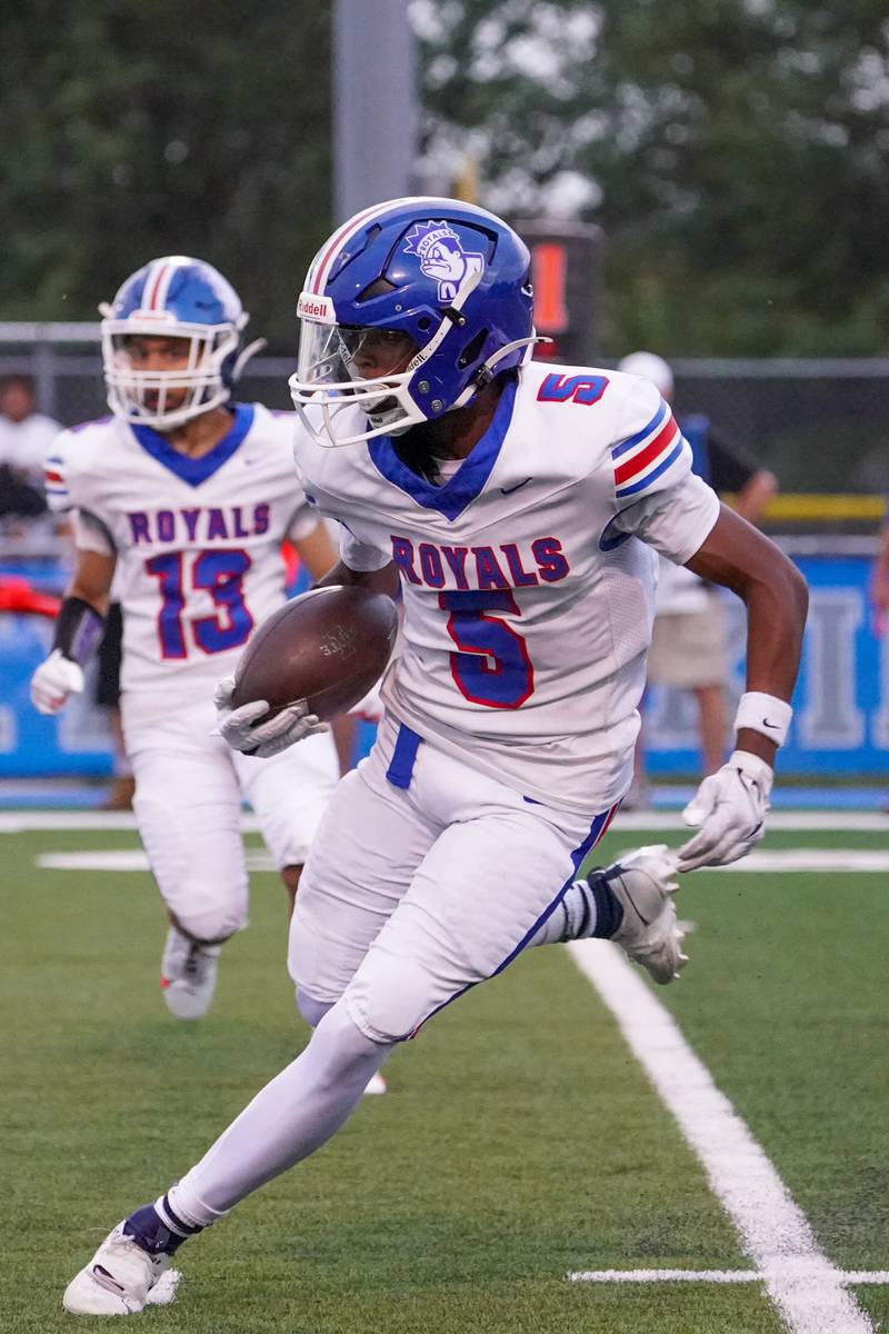 Larkin’s Donald Clark (5) returns a kick-off against Geneva during a football game at Geneva High School on Friday, Aug 30, 2024.
