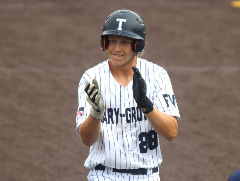 Cary-Grove’s Brock Iverson reacts after reaching safely for a single against Triad in IHSA Class 3A Third Place Game baseball action at Slammer Stadium in Joliet on Saturday, June 14, 2025.
