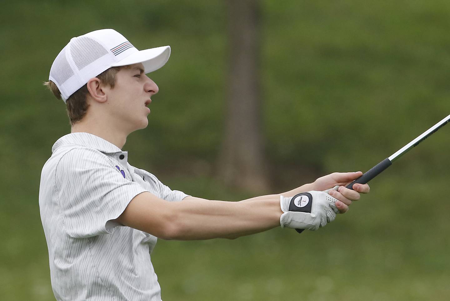 Hampshire’s Nolan Adamczyk hits a fairway shot on the fourth hole during the IHSA Class 3A Hampshire Regional golf tournament on Wednesday, Sept. 27, 2023, at Randall Oaks Golf Club in West Dundee.
