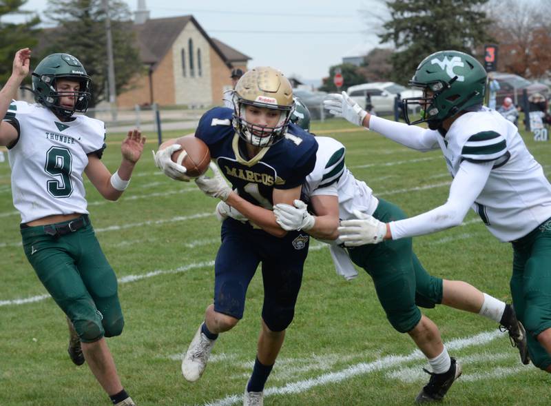 Polo's Mercer Mumford (1) looks for yards after catching a pass for a gain against West Carroll during 8-man football playoff action on Saturday, Nov. 9, 2024 at Polo High School.