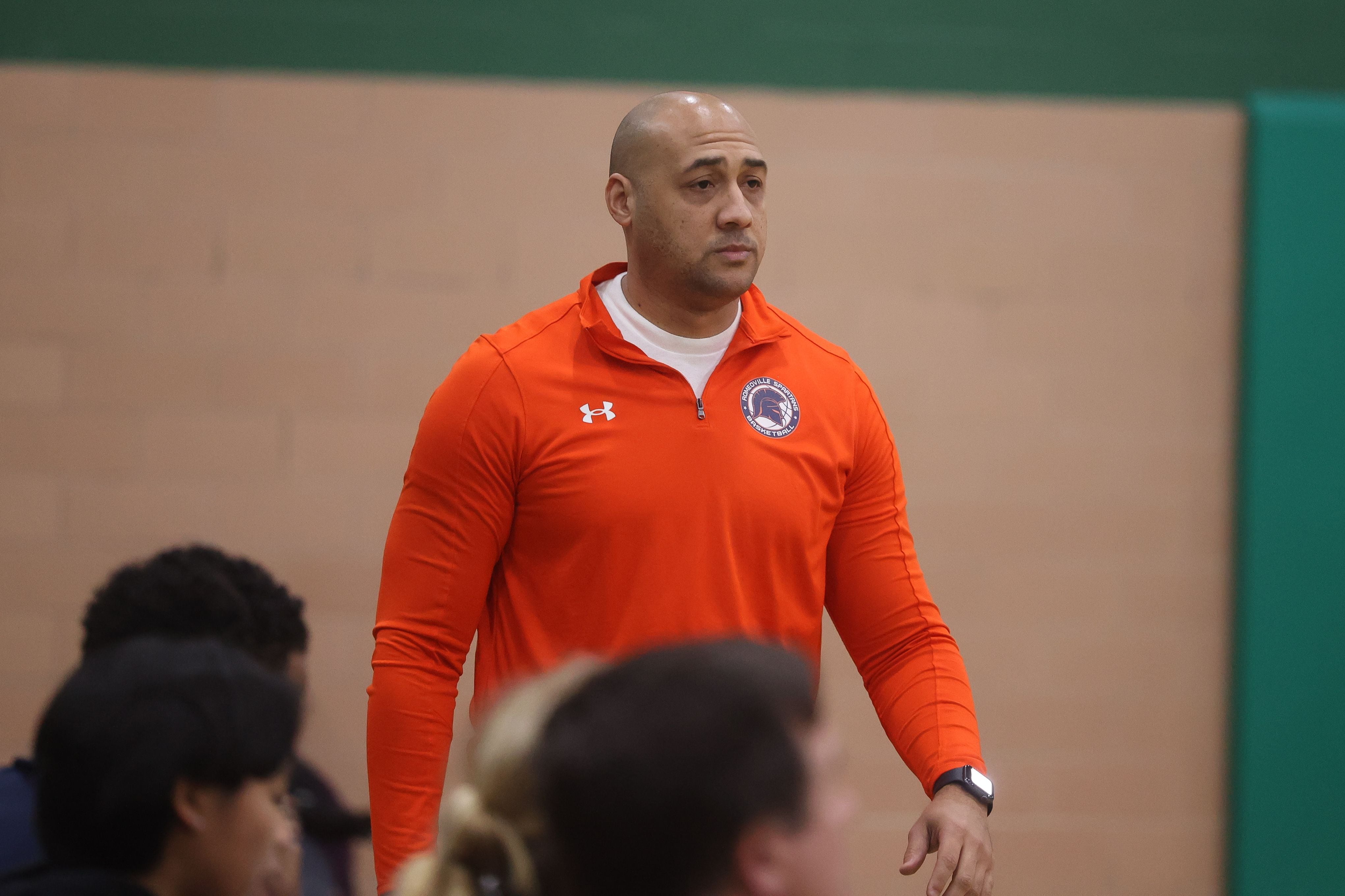 Romeoville head coach Kevin Bates walks the sidelines during the game against Lockport in the Oak Lawn Holiday Tournament championship on Saturday, Dec.16th in Oak Lawn.