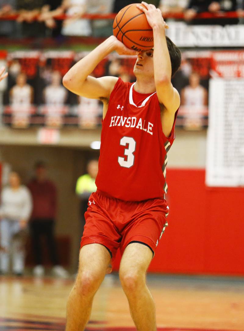 Hinsdale Central's Emerson Eck (3) takes a three-point shot during the Hinsdale Central Holiday Classic championship game between Oswego East and Hinsdale Central high schools on Thursday, Dec. 29, 2022 in Hinsdale, IL.